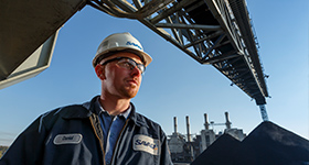 Man at industrial facility